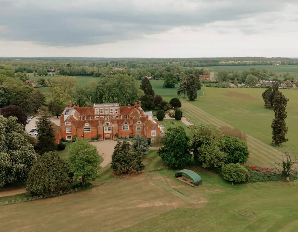 Aerial view of Gosfield Hall in Essex on Micha and Ryan's wedding day