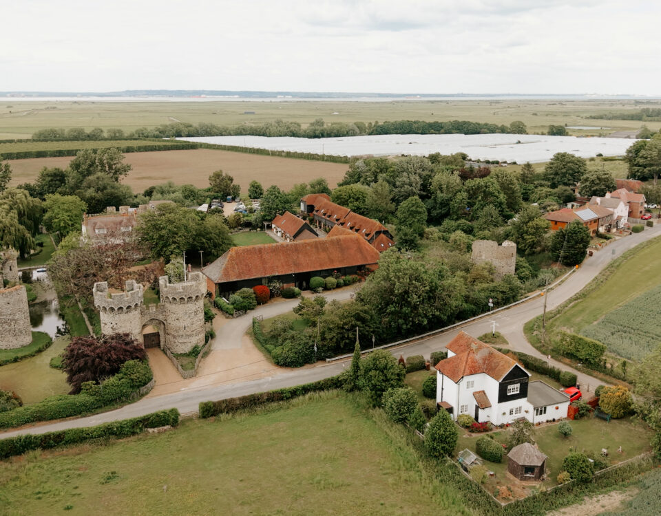 Aerial view of Cooling Castle Barn for Lauren and Lee's wedding